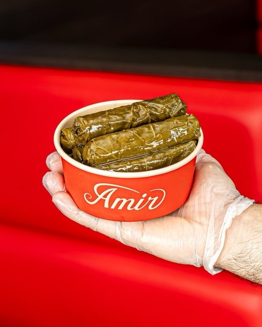 Amir food photography showing a side of garlic sauce.